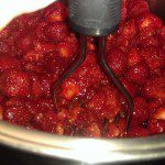Mashing the strawberries for the jam