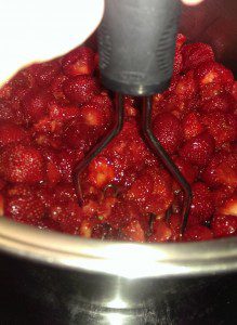 Mashing the strawberries for the jam