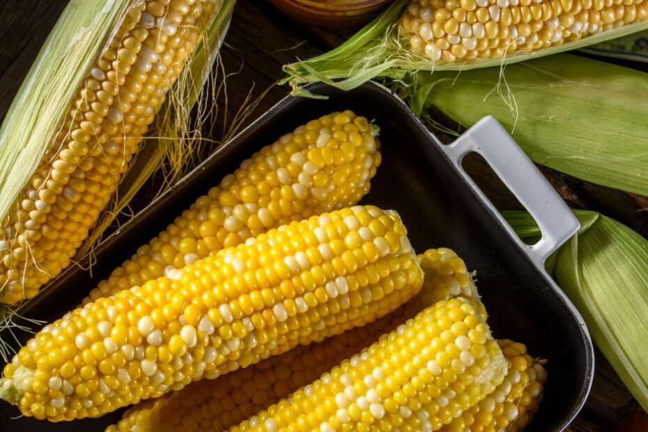 corn on the cob in a pan.