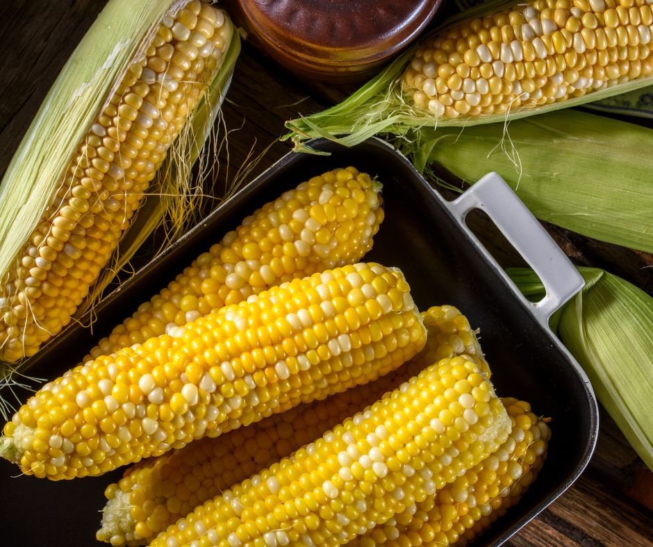 corn on the cob in a pan.