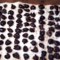 Pitted olives drying on a bed of salt
