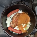 Assembled ingredients for Sopa de Garbanzo on the stove