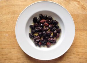 Dry cured olives on a dish