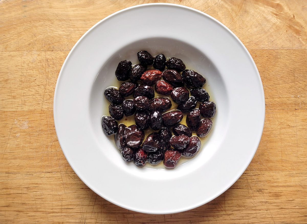 Dry cured olives on a dish