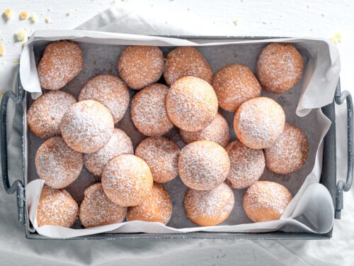Cake donut holes with powdered sugar