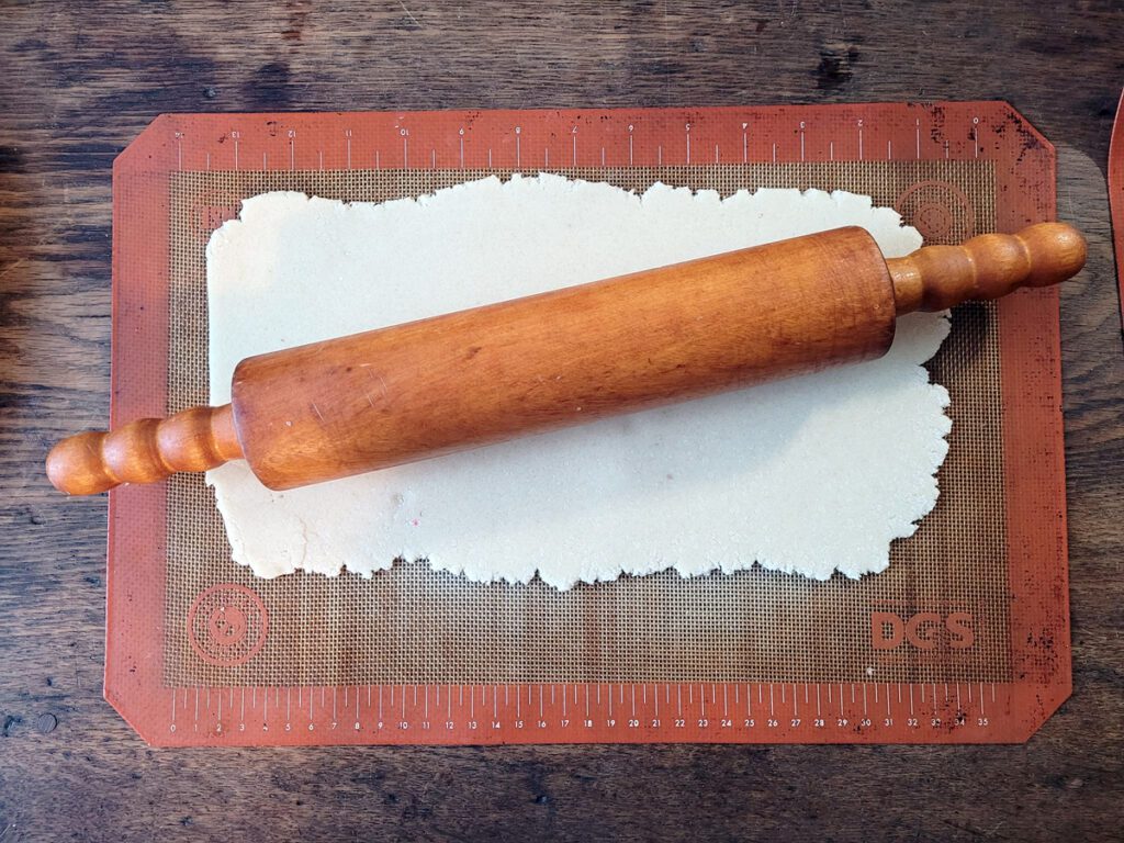 Rolling marzipan for a fruitcake