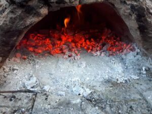 Helmut with burning coals