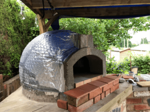 Andy's oven in process, with the reflective wrap
