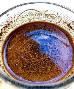 Coffee grounds in the saucer for fortune telling