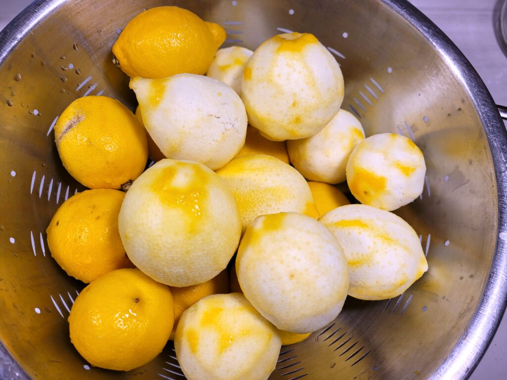 Partially peeled lemons for limoncello