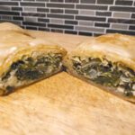 Finished Spanakopita, cut and ready to serve