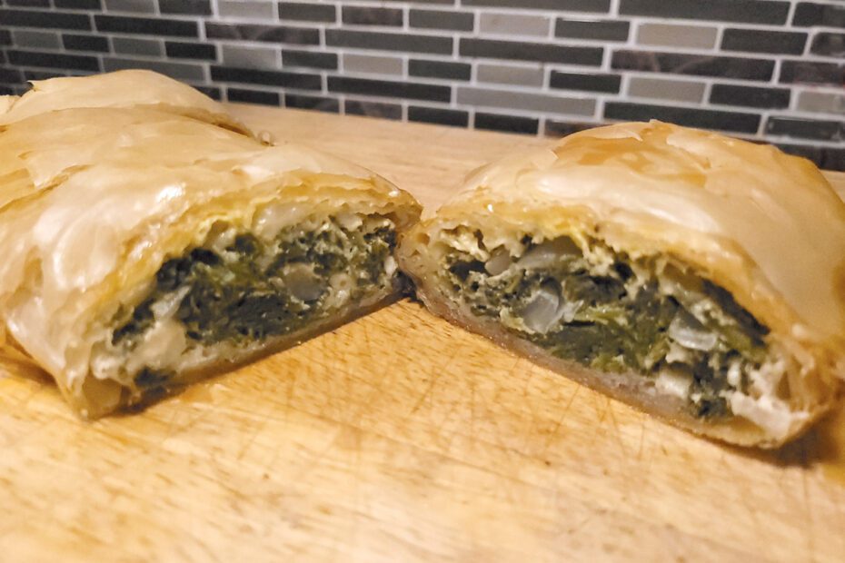 Finished Spanakopita, cut and ready to serve